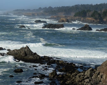 Photograph of big waves rolling into the rocky coast at Mendocino, California