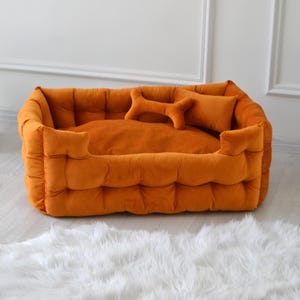 Pet anxiety bed for large dogs in orange with personalization