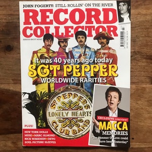 May include: A magazine cover featuring a photo of the Beatles in their Sgt. Pepper's Lonely Hearts Club Band costumes. The cover title is "Record Collector" and the headline reads "It was 40 years ago today Sgt. Pepper Worldwide Rarities".
