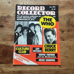 May include: A vintage magazine cover featuring a photo of The Who band members, with the title "The Who" in large, bold letters. The magazine is called "Record Collector" and features articles about Culture Club, Guy Mitchell, Chuck Berry, Wayne Fontana and the Mindbenders, and Jackie Edwards.