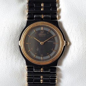 Reloj Seiko Vintage Negro y Dorado Años 90 ¡Único!