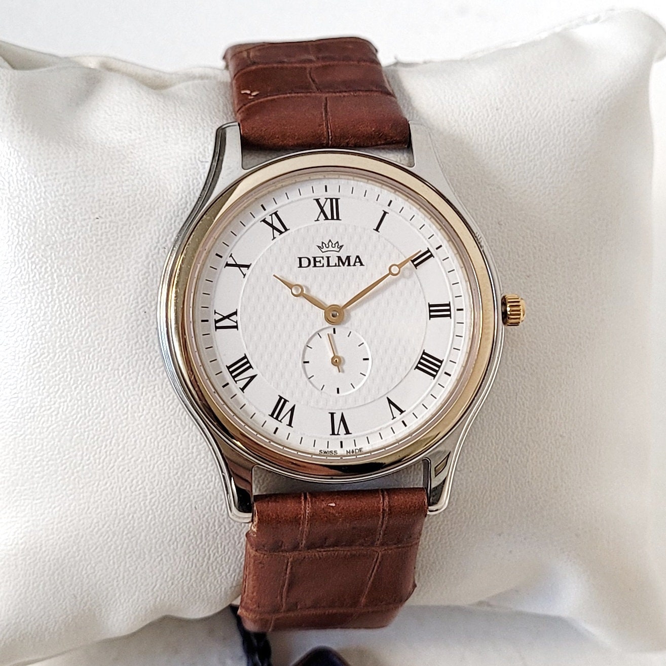 Delma swiss watch price hotsell