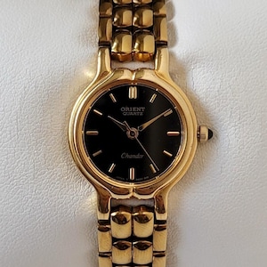 Vintage Orient zwart en goud voor dames jaren 90 Uniek