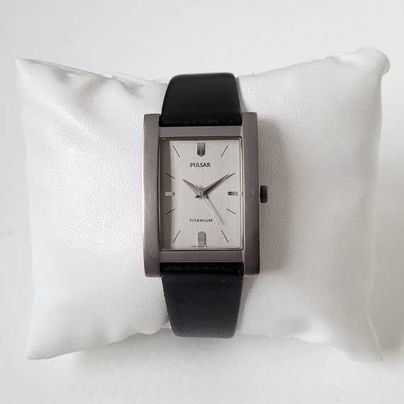 Reloj pulsar titanium new arrivals