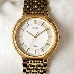 Reloj Seiko Classic dorado vintage de los años 90, ultra raro