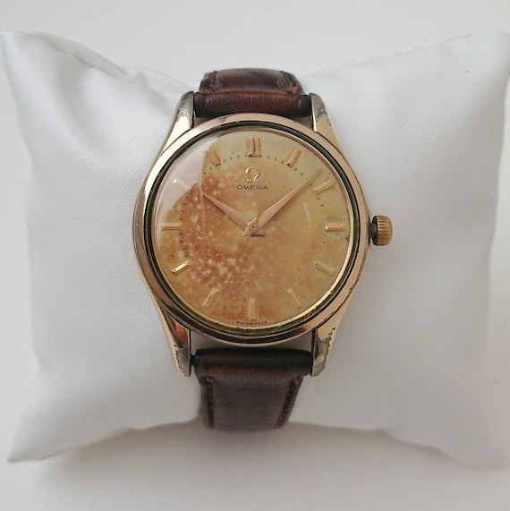 Omega oro anni 50 hot sale