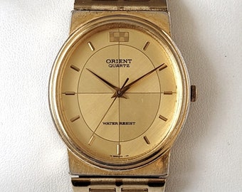 vintage Orient gold bracelet Watch 時計 Vintage Orient Gold Elliptical 90s Unique - Etsy