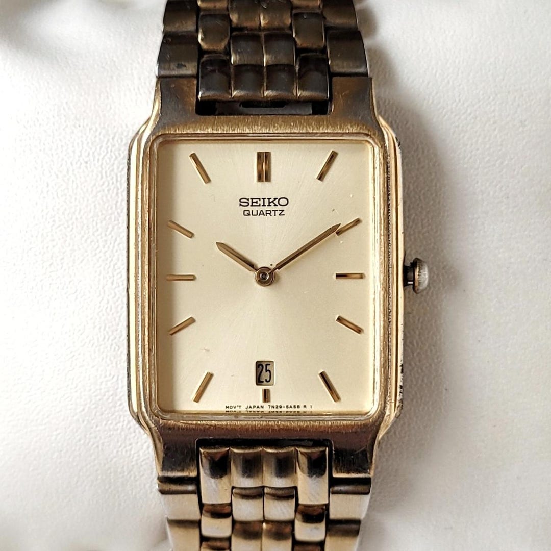 SEIKO クォーツ 金文字盤 レクタンギュラー腕時計 メンズ ヴィンテージ il_1080xN.6831121964_s0ee.jpg