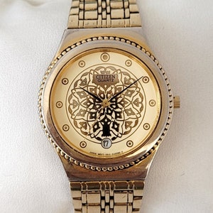 Reloj Citizen dorado vintage de los 90, único.