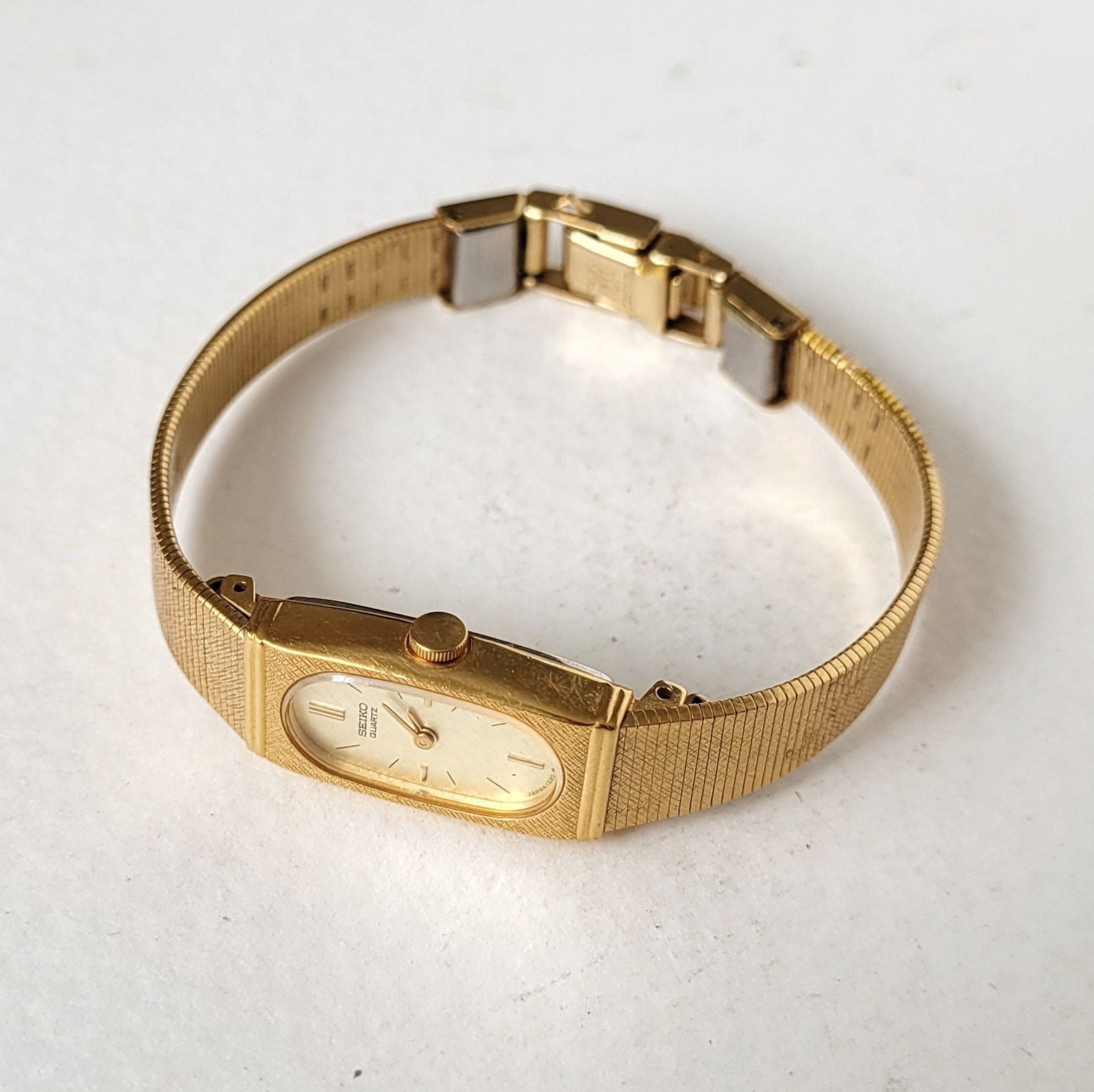 SEIKO ゴールド　ヴィンテージ　ブレスレットウォッチ　クォーツ ヴィンテージ セイコー ブレスレットウォッチ 80年代 シャイニング