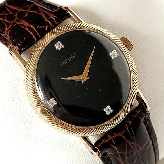 SEIKO WE WILL 時計 ゴールド ブラック Seiko Watch Gold & Black Two Tone Black Dial Men's Quartz