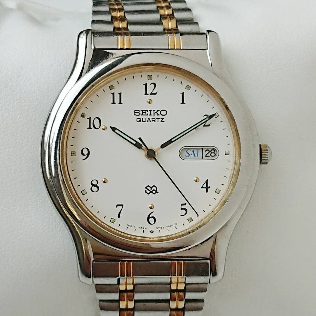Vintage Seiko SQ Gold&steel 80s Unique - Etsy Vintage Seiko SQ Gold&steel 80s Unique - Etsy