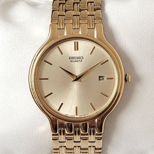 Reloj Seiko vintage dorado brillante de los años 90