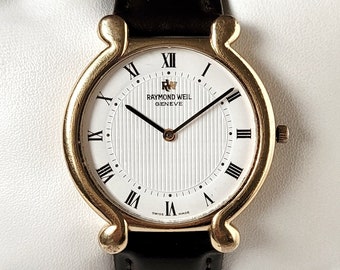RAYMOND WEIL ゴールド s-l400.png