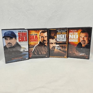 May include: Four DVD cases featuring Tom Selleck in the "Jesse Stone" film series. The titles include "Stone Cold", "Sea Change", "Night Passage", and "No Remorse". Each case has a photo of Tom Selleck on the cover.