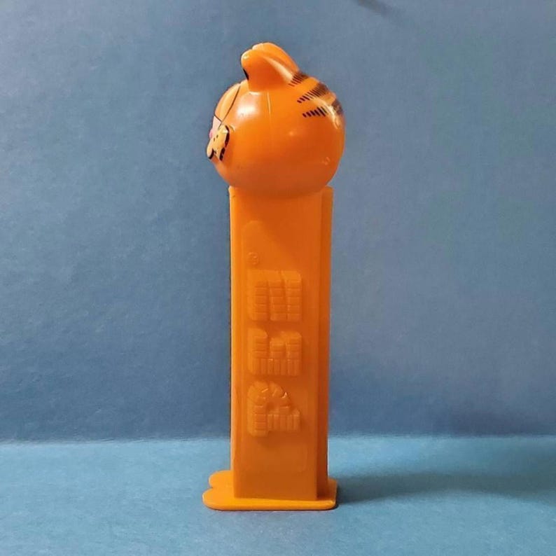 Garfield pez depencer toy, collectable - Etsy