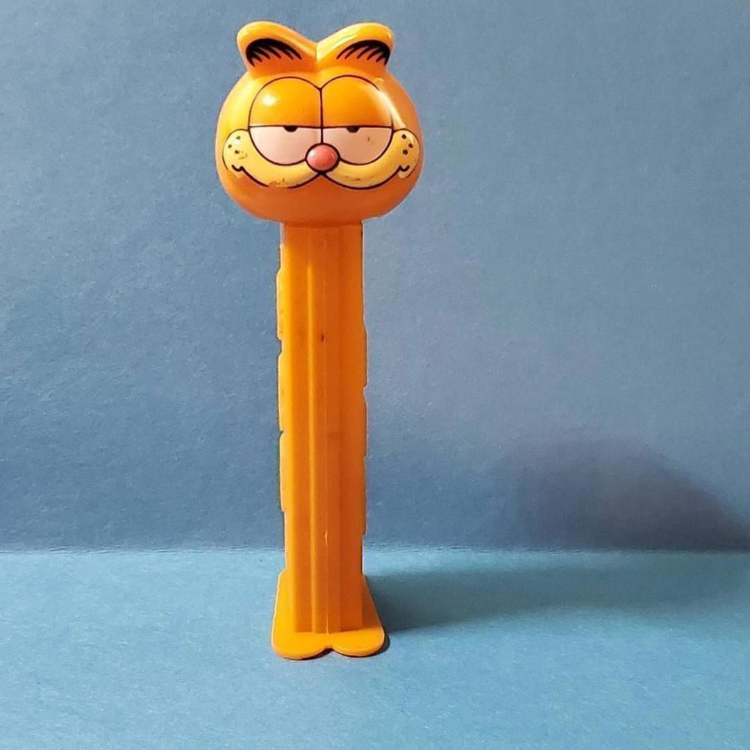 Garfield pez depencer toy, collectable - Etsy