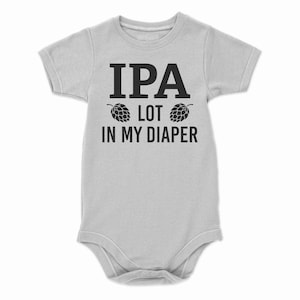 May include: A gray baby onesie with black text that reads "IPA LOT IN MY DIAPER" with two black hop cones on either side of the word "LOT".