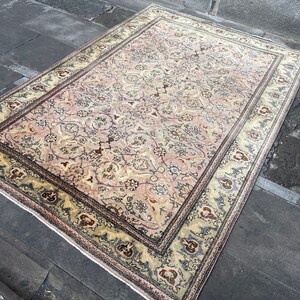 Oversized Muted Hereke Rug: 5.5x8.2 ft Turkish Wool Area Rug
