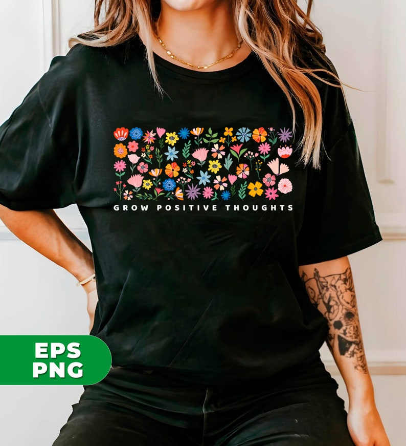 May include: Black t-shirt with a colorful floral design and the text "Grow Positive Thoughts".