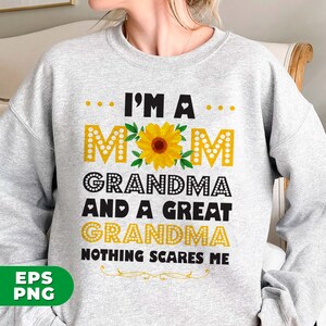 May include: Gray sweatshirt with a sunflower graphic and the text "I'm a Mom Grandma and a Great Grandma Nothing Scares Me".
