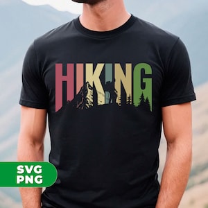 May include: A black t-shirt with a colorful graphic design that says "HIKING" with a silhouette of a hiker in the mountains.