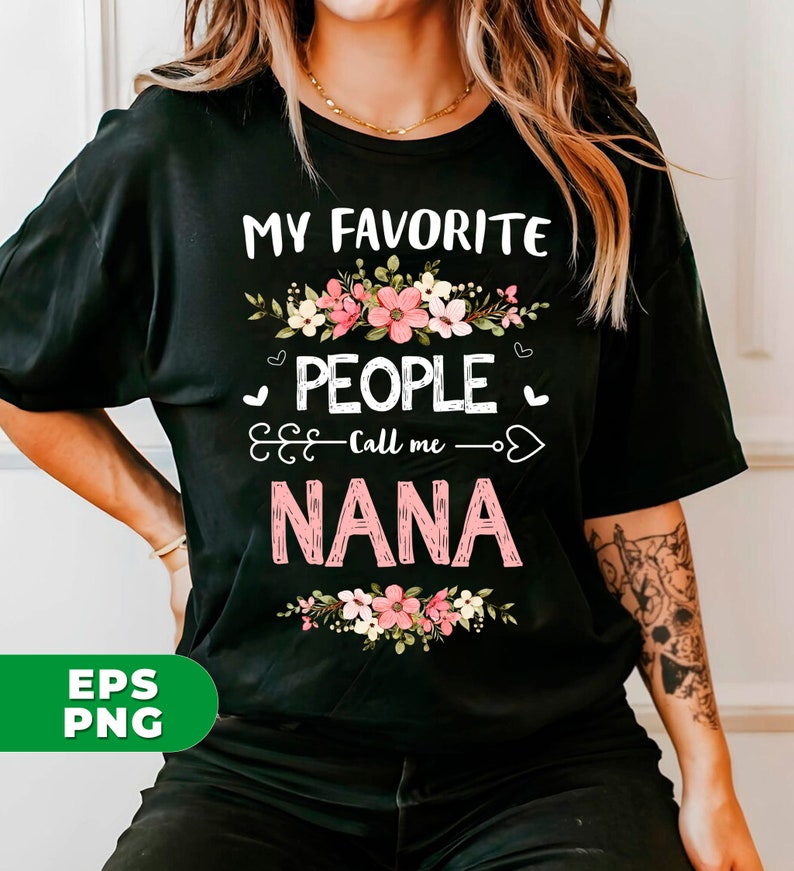 May include: Black t-shirt with white text that reads "My Favorite People Call Me Nana" with pink floral accents.