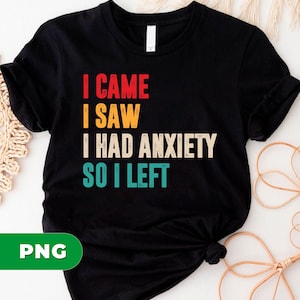 May include: Black t-shirt with the text "I CAME I SAW I HAD ANXIETY SO I LEFT" in red, yellow, white, and teal lettering. The shirt is knotted at the bottom.