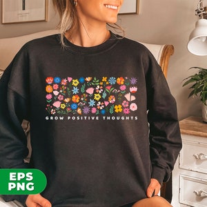 May include: Black sweatshirt with a colorful floral design and the text "Grow Positive Thoughts".