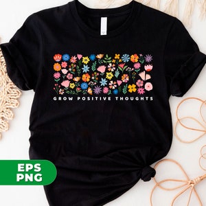 May include: Black t-shirt with a colorful floral design and the text "GROW POSITIVE THOUGHTS" printed on the front.