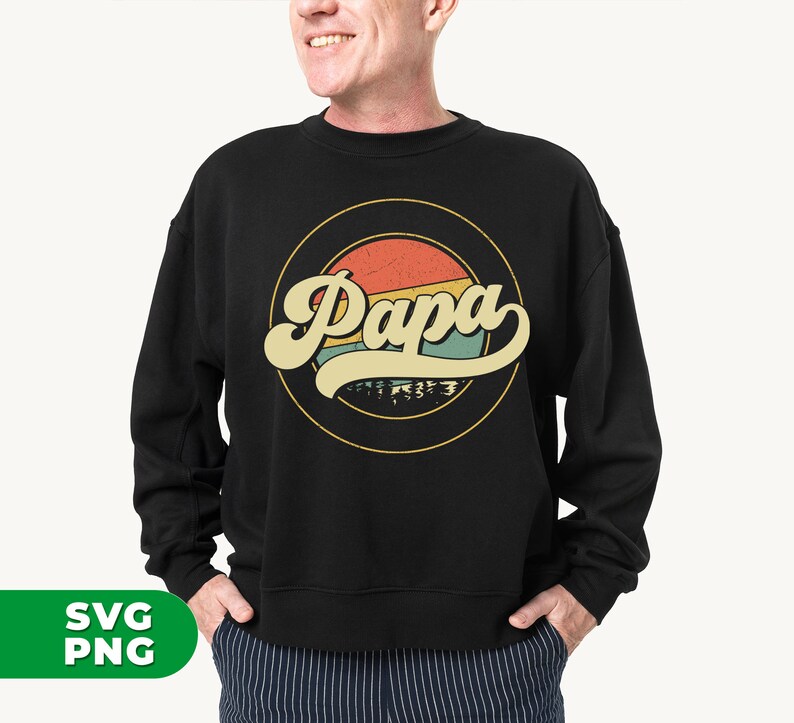 Puede incluir: Sudadera negra con un gr&aacute;fico retro de un sol con la palabra "Papa" en una fuente amarilla, naranja y azul.
