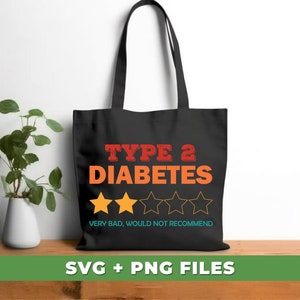 May include: A black tote bag with the text "TYPE 2 DIABETES" in red and orange letters. Below the text are five yellow stars, with three stars filled in and two stars empty. The text "VERY BAD, WOULD NOT RECOMMEND" is below the stars.