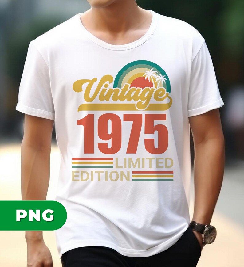 May include: White t-shirt with a retro design. The design includes the word "Vintage" in yellow script, the number "1975" in red, and the words "Limited Edition" in a smaller font. A colorful sun and palm trees complete the design.