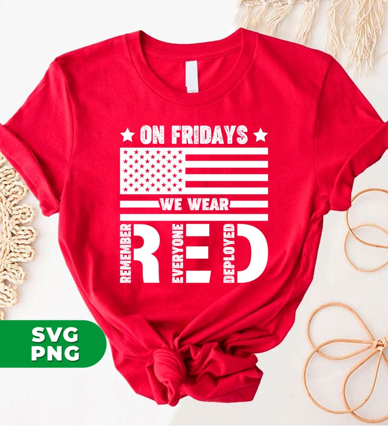 May include: Red, white, and blue American flag design on a red t-shirt. The text reads "On Fridays We Wear Red" with the word "Red" spelled vertically with the letters "R", "E", and "D" each representing "Remember Everyone Deployed".
