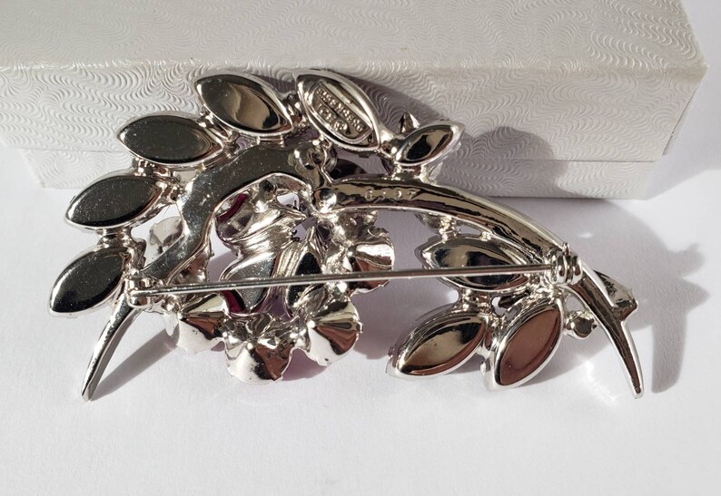 Purple and Clear Rhinestone Crystals in Rhodium Plate Large Brooch signed and numbered 6197 Eisenberg Ice Hot Pink