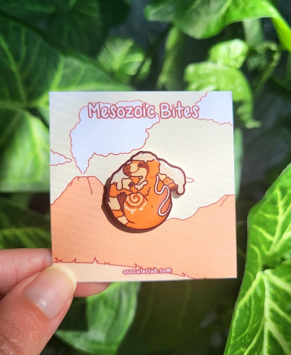 Cinnamon Sinosauropteryx Shrink Plastic Pin | Mesozoic Bites
