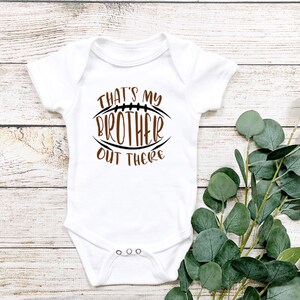 That&#39;s my Brother Out There Line Drawing Football Baby Bodysuit/ Onesie