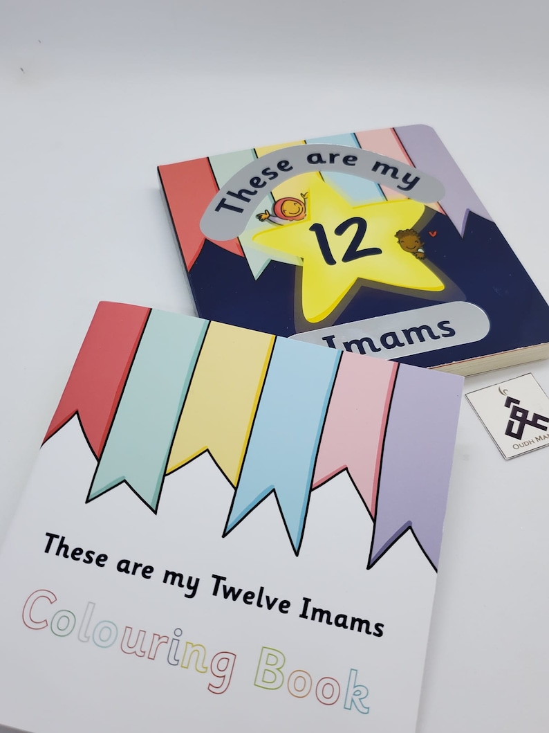May include: A coloring book with a white cover and colorful flags on the top. The title is "These are my Twelve Imams Coloring Book".