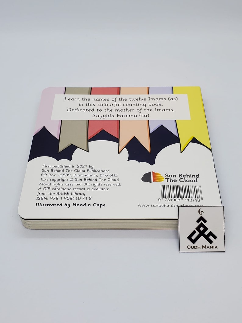 May include: A colorful counting book for children featuring the names of the twelve Imams (as). The book is dedicated to the mother of the Imams, Sayyida Fatema (sa). The book cover features a cloud with the title "Sun Behind The Cloud" and a barcode.