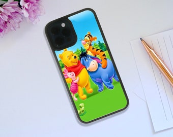 May include: A black phone case with a colorful cartoon image of Winnie the Pooh, Piglet, Eeyore, and Tigger. The characters are smiling and standing together.