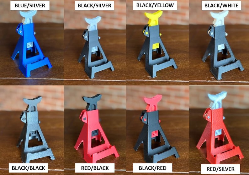 May include: Eight miniature car jack stands in different color combinations. The stands are made of plastic and have a silver metal hook. The colors include blue, black, yellow, white, red, and silver.