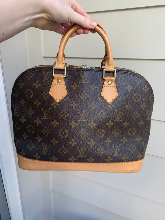 Authentic Louis Vuitton monogram Alma Pm bag