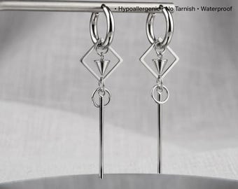 May include: Silver hoop earrings with geometric diamond and cone pendants, and long vertical bars. The earrings are displayed on a silver bar against a soft background. The text "MADE TO LAST" is at the top, with "Hypoallergenic No Tarnish Waterproof" below.