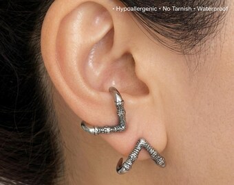 Clous d'oreilles en titane avec griffe de dragon : bijoux unisexes gothiques
