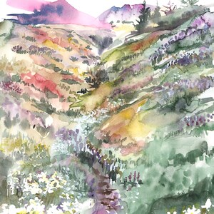 May include: Watercolor painting of a mountain landscape with a valley filled with colorful wildflowers. The sky is a soft pink and purple, and the mountains are a muted green and brown. The wildflowers are a variety of colors, including white, pink, purple, and yellow.