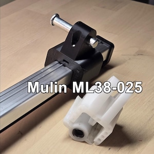 May include: A black and silver metal rod with a black plastic connector and a white plastic connector. The rod is labeled "Mulin ML38-025".