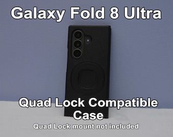 May include: A black protective phone case for a Galaxy Fold 8 Ultra featuring a circular mounting interface on the back. The text Galaxy Fold 8 Ultra, Quad Lock Compatible Case, and Quad Lock mount not included are visible on the image.