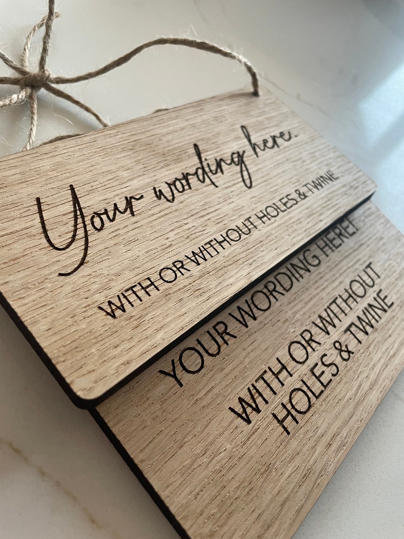 May include: Two wooden signs with the text "Your wording here. WITH OR WITHOUT HOLES & TWINE" and "YOUR WORDING HERE! WITH OR WITHOUT HOLES & TWINE".
