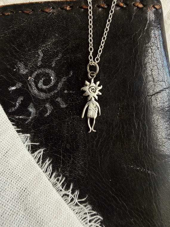 太陽男 - Etsy 日本
