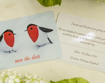 Original and unique save the date wedding announcement. Red robin design.